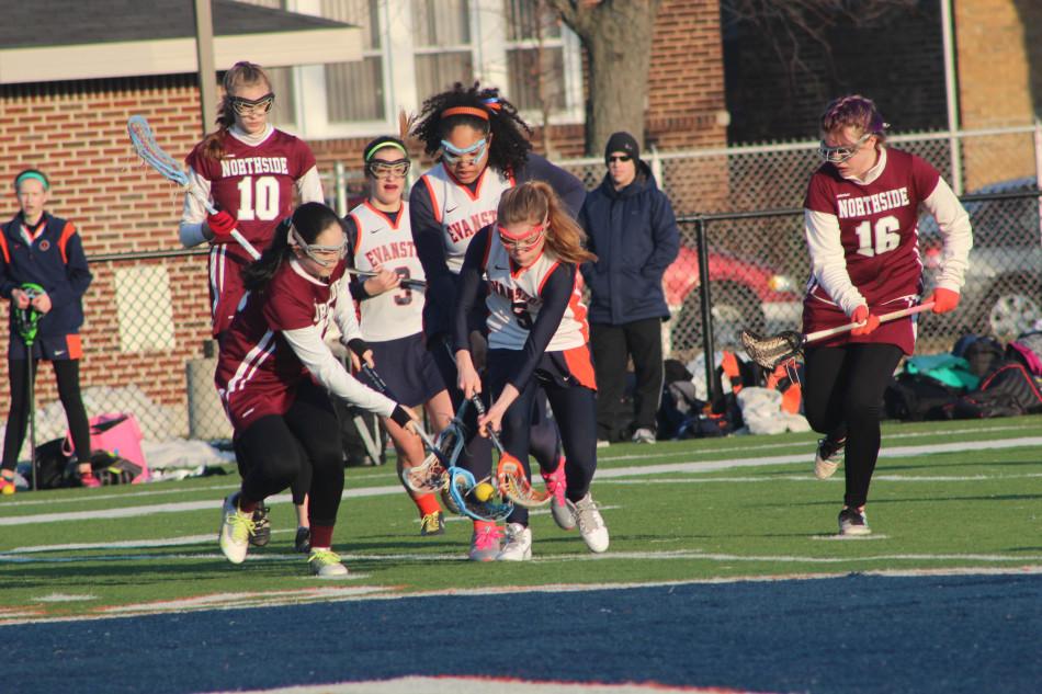 Junior Charley Rees goes after a ground ball against Northside College Prep on March 18