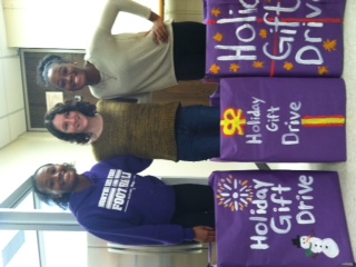 Seniors Micaela Homer, Adrianna and Erika Carter prepare for the gift drive.