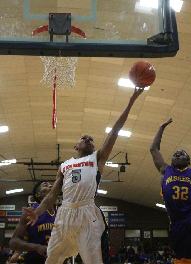 Senior Alante Massie scores a layup against Waukegan