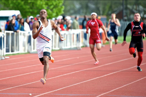 Reggie Murphy (left) at a track meet. 