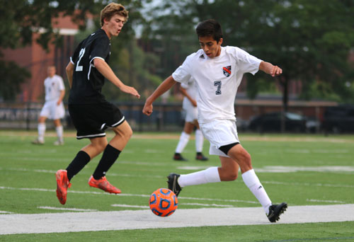 Ricardo Ramirez battles opponent for control.