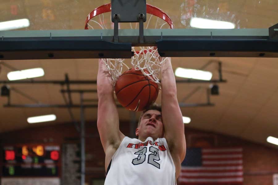 Center Dylan Mulvihil dunks.