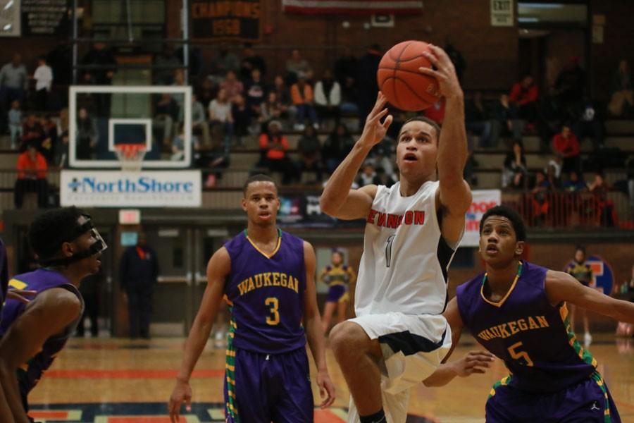 Senior Micquel Roseman goes up for an easy lay-in against Waukegan. 