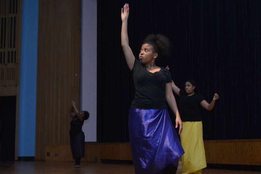 Student dancers perform a traditional dance. 