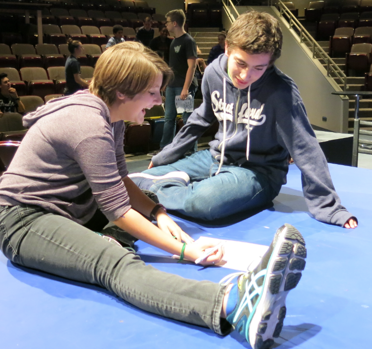 The cast of YAMO rehearse for their upcoming production