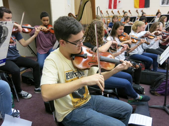 Holiday concert unites music programs