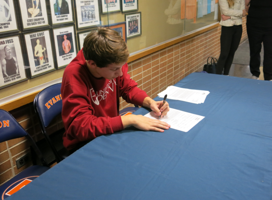 Turner Dobbs signs his commitment papers