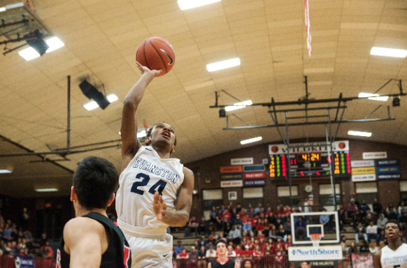 Sophomore Ryan Bost drives for a shot