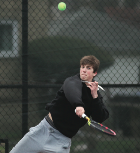 Junior Cameron Behr prepares for an upcoming match