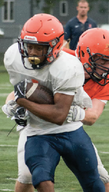 Junior Trenton Bertrand gets tackled during a recent practice.