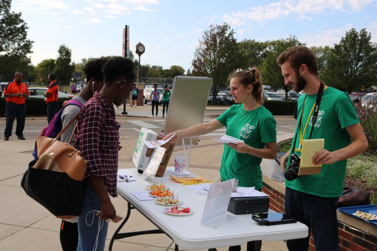 Students participate in the first Top Box delivery