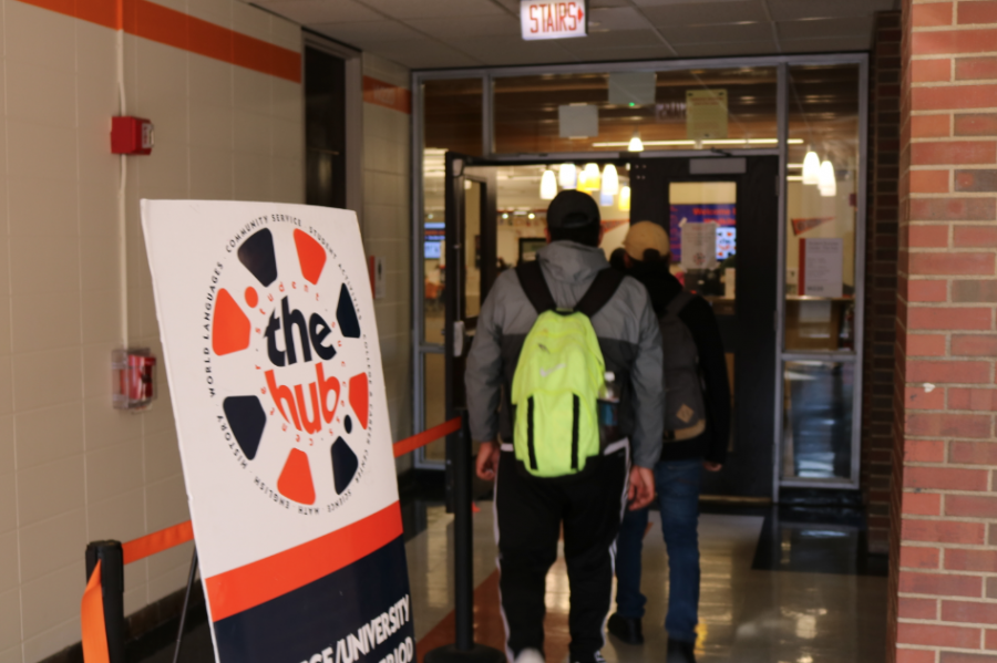 Students line up outside the Hub during a free period.