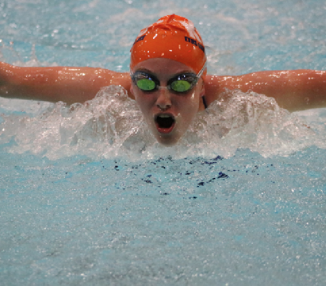 Junior Sydney Hollingsworth competes at a meet.