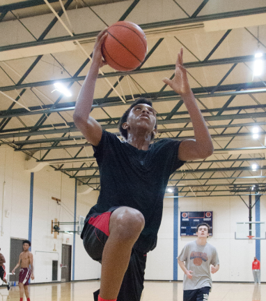 Junior Jalen Christian shoots a layup.