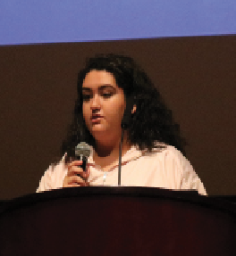 Senior Sofia Garcia presents at awards.