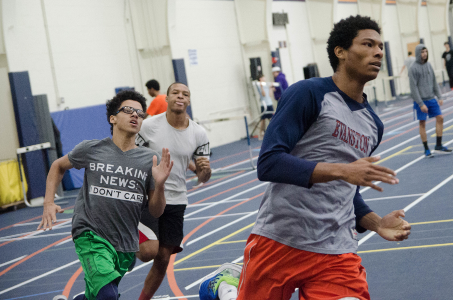 Members of the ETHS track team sprint during practice.