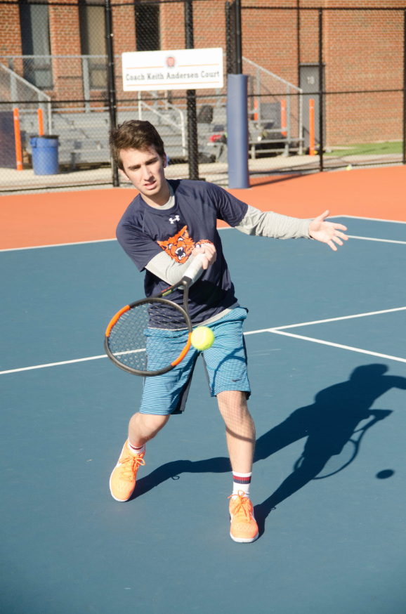 Junior Andy Perez perfects his forehand.