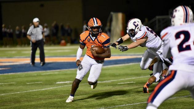 Junior Quadre Nicholson dodges a Conant defender.