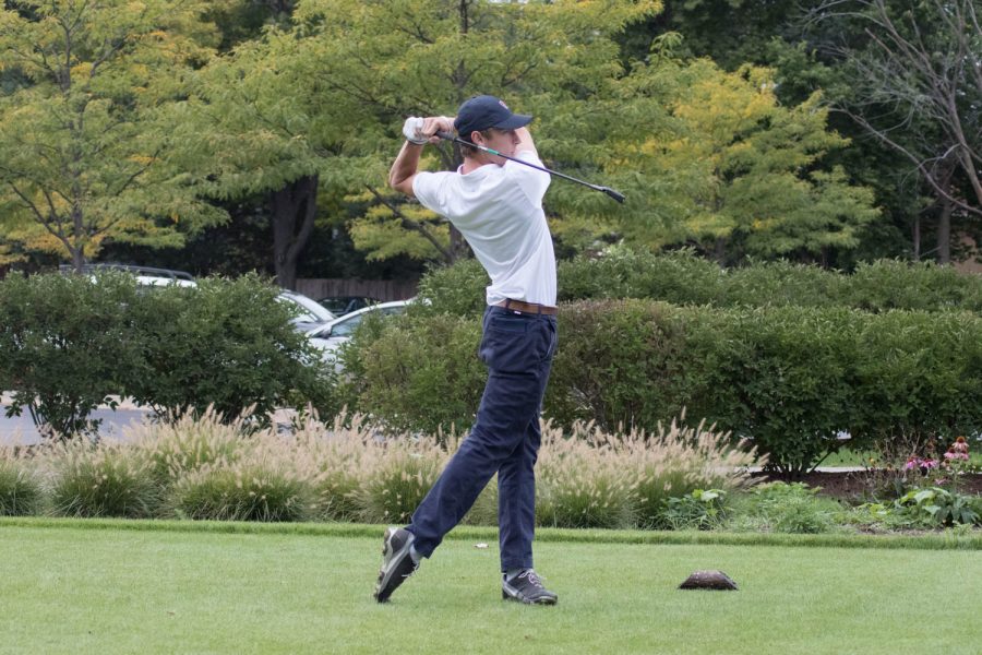 Senior captain Tommy Barbato tees off at an early season tournament.