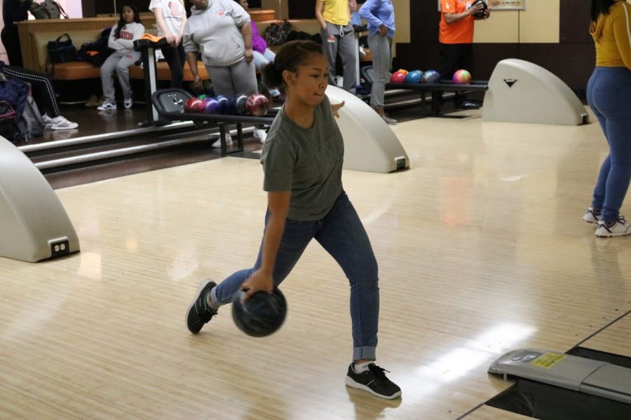 Junior Asya Wright bowls a strike.