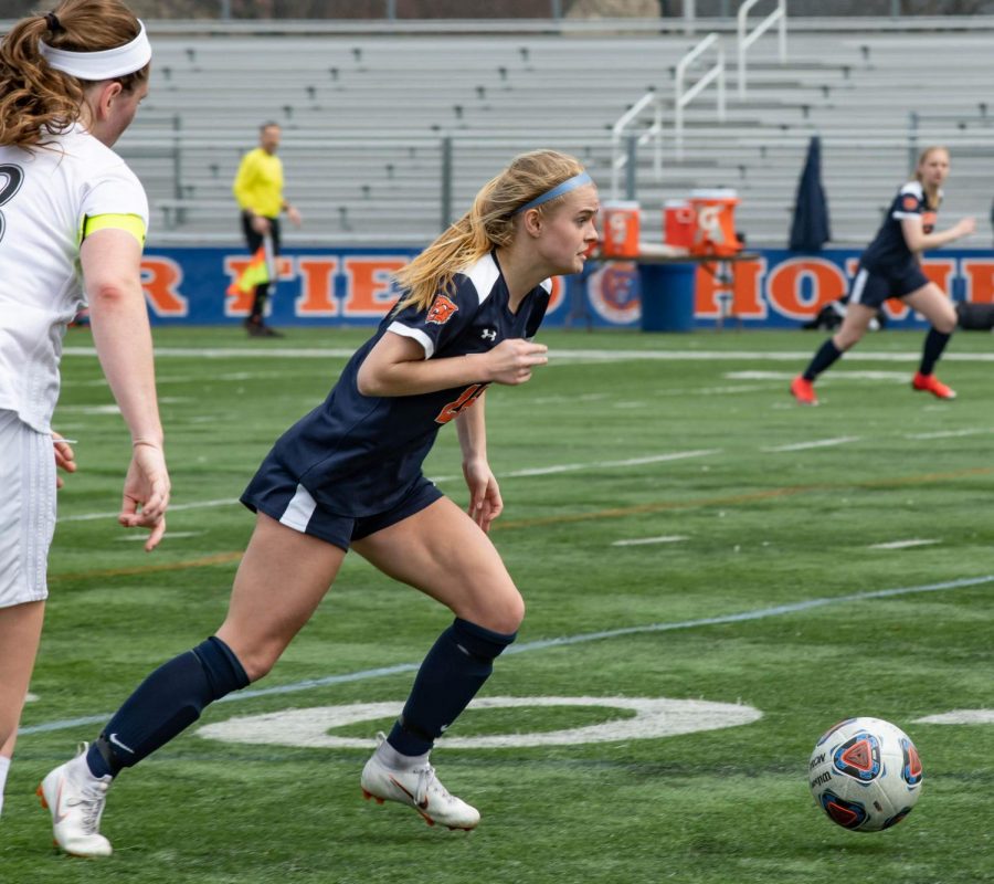 Kerr sprints up the pitch.