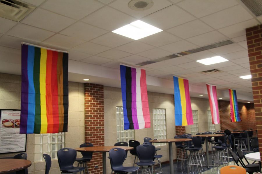 Flags hang in South Study Cafe on summit day. 