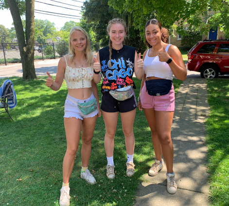 Seniors Amelia Carlson, Erin Oakley and Sophie Brown wear fanny packs to Lollapalooza. 