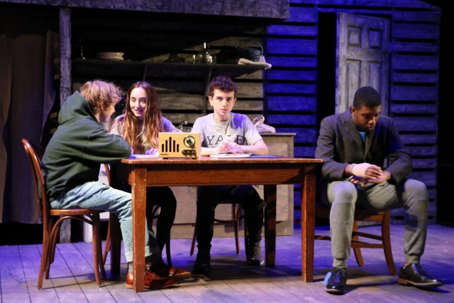 Actors rehearse a scene from The Diary of Anne Frank