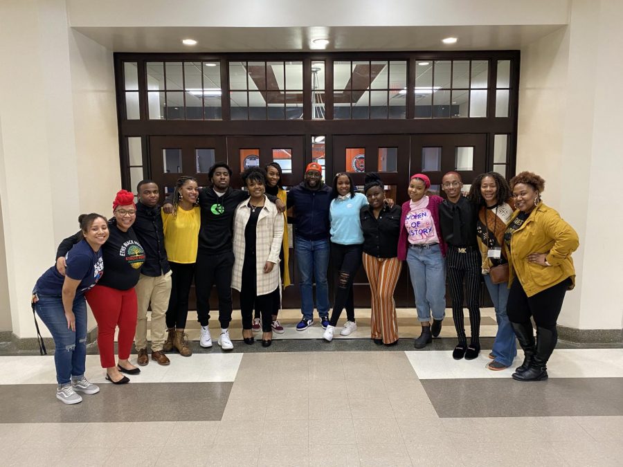 Student entrepreneurs and staff organizers gather together to commemorate the success of the inaugural ETHS Black History Month Pop Up Shop.