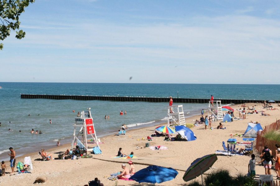 Evanstonians return to Lighthouse Beach after its reopening. 