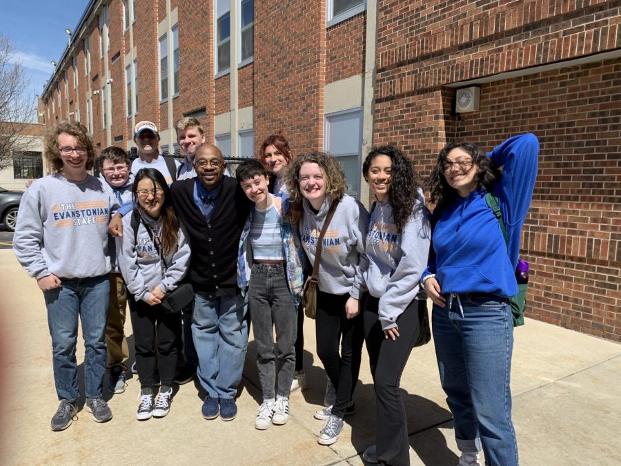 Lowe, Krumholz (back row, first from right) and other members of The Evanstonian staff in 2019