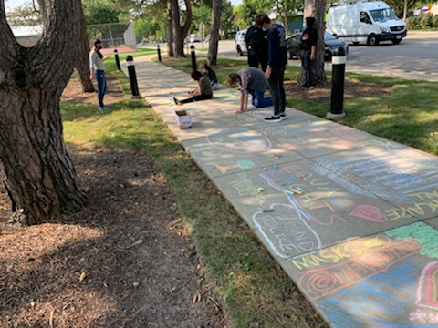 Students participate in a CSC chalk-out on Sept. 21.