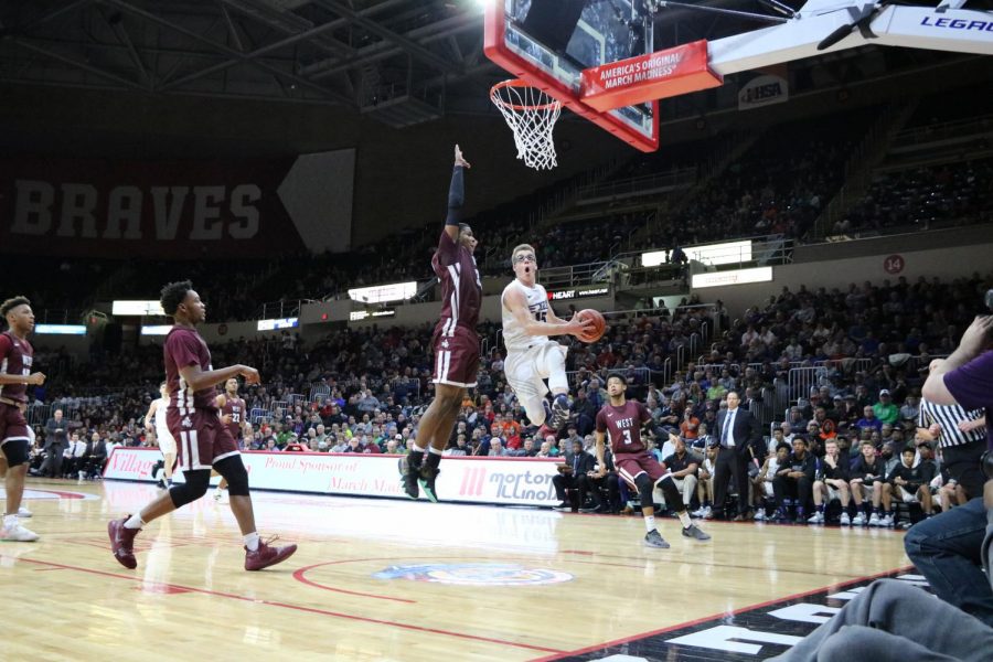 Blake Peters goes up for a layup in the 4A State Championship game against Belleville West