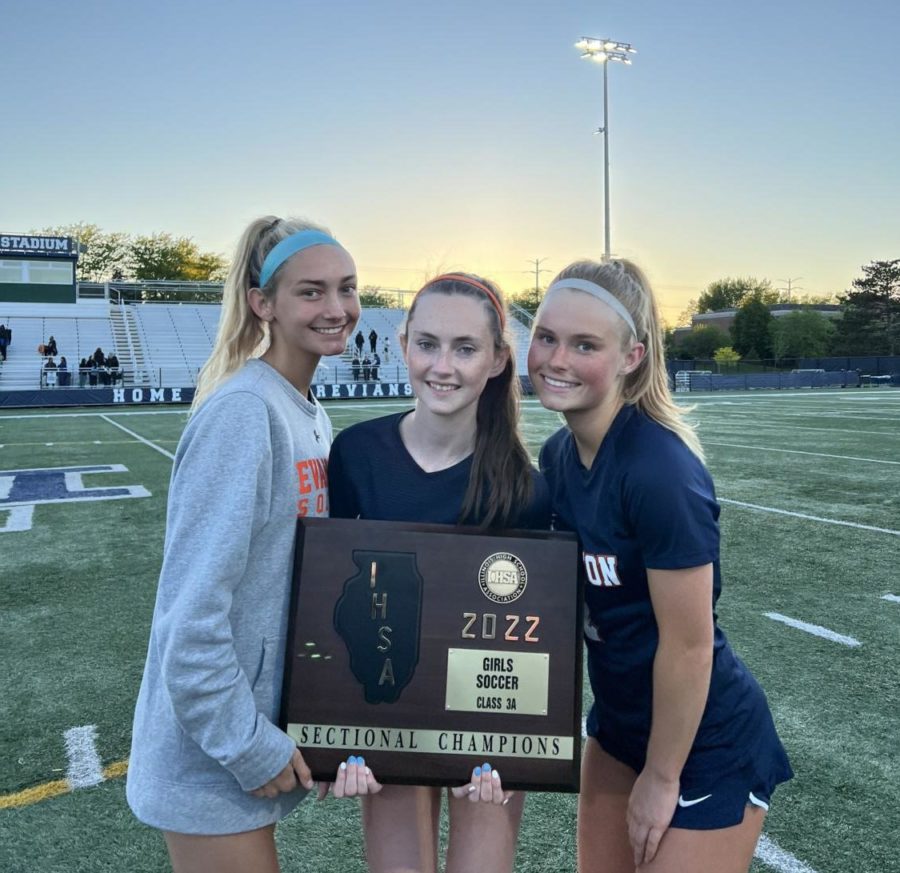 Then-juniors Anna Bergmann, Brigid Mulvihill and Molly
Riley celebrate 2022 Sectional victory. (Photo courtesy of Anna Bergmann.)