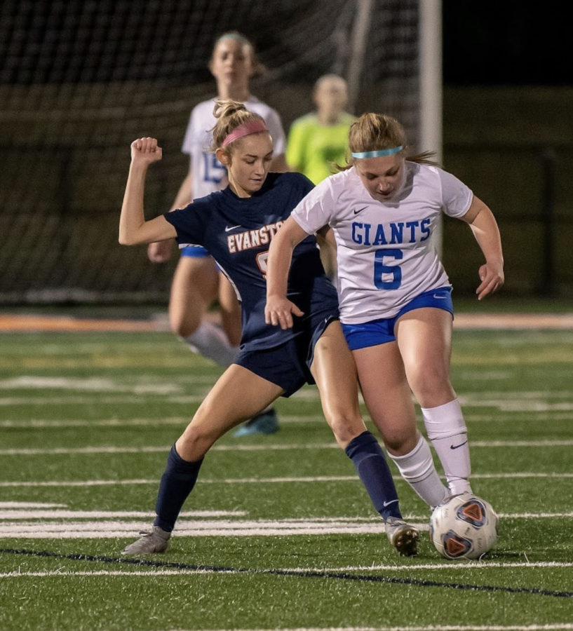 Brigid Mulvihill fiercely defends against Highland Park Giants. (Photo courtesy of Brigid Mulvihill.)