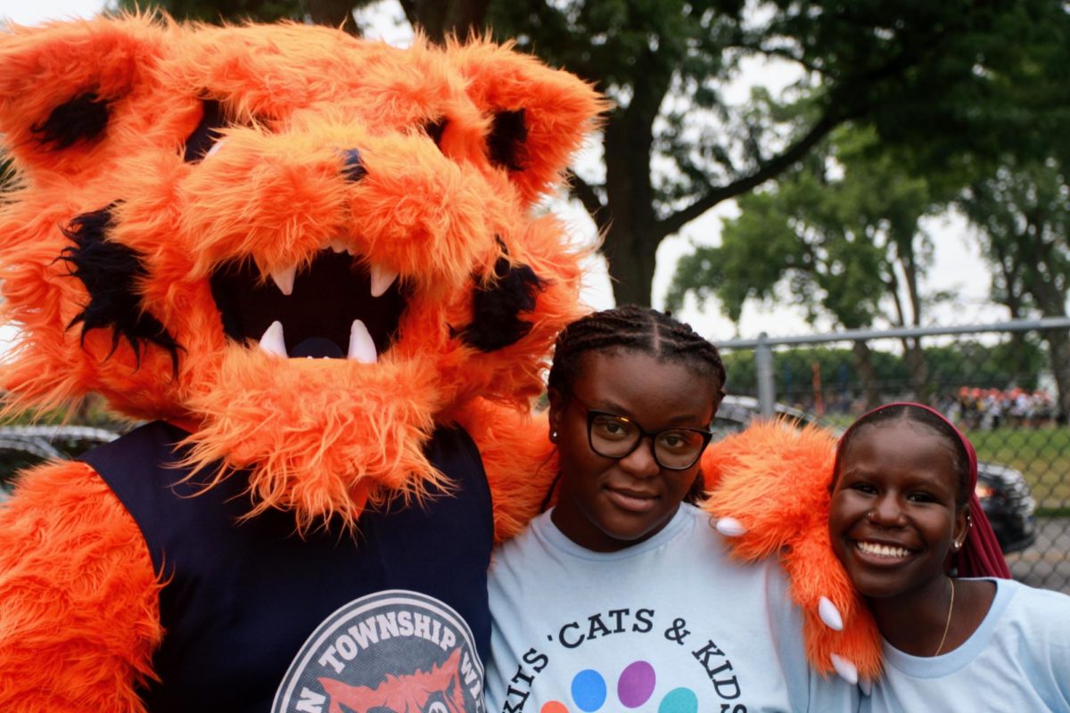 The+Kits%2C+Cats+and+Kids+Block+Party+aimed+to+bring+together+the+Evanston+community+and+celebrate+the+longstanding+partnership+between+ETHS+and+Northwestern.