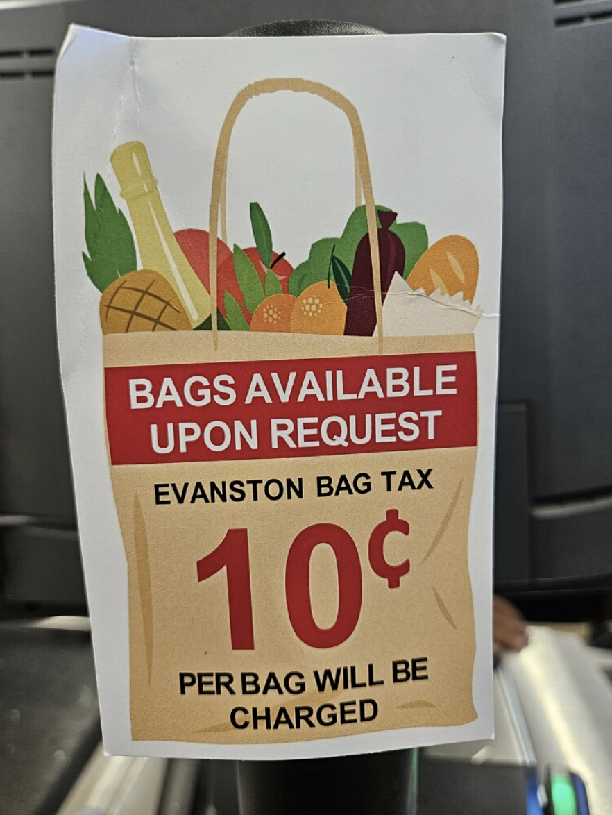 Sign+informing+customers+of+the+bag+tax+at+Jewel-Osco.