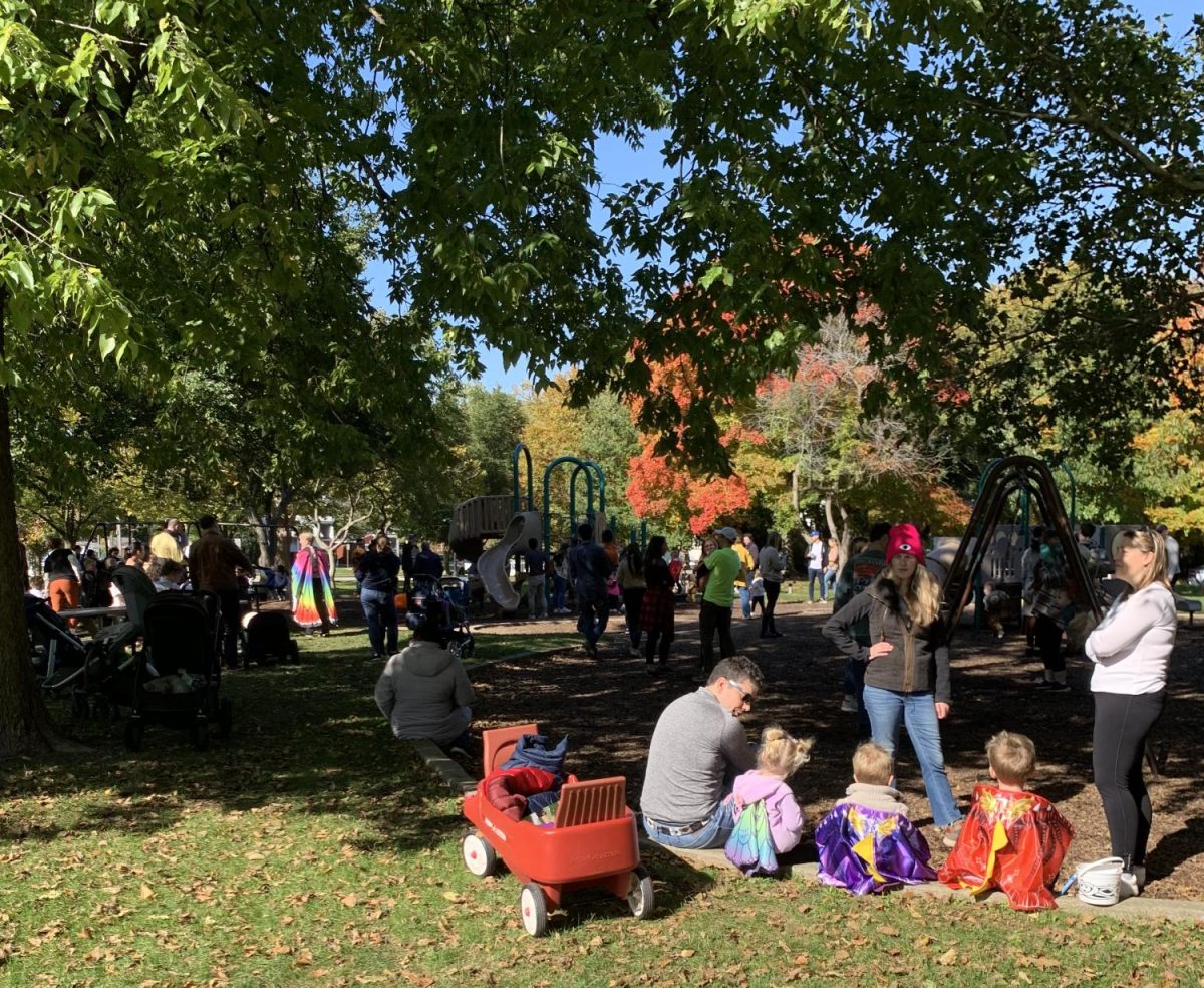 Parents and children gathered at Independence Park along Central Street to take a break from trick-or-treating.