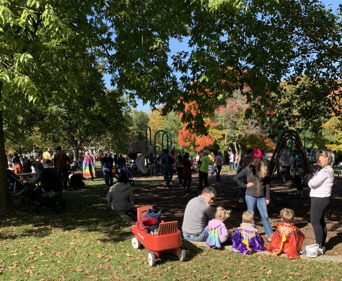 Parents+and+children+gathered+at+Independence+Park+along+Central+Street+to+take+a+break+from+trick-or-treating.