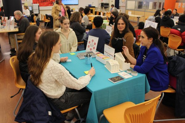 Students mingled among tables manned by local nonprofit organizations.