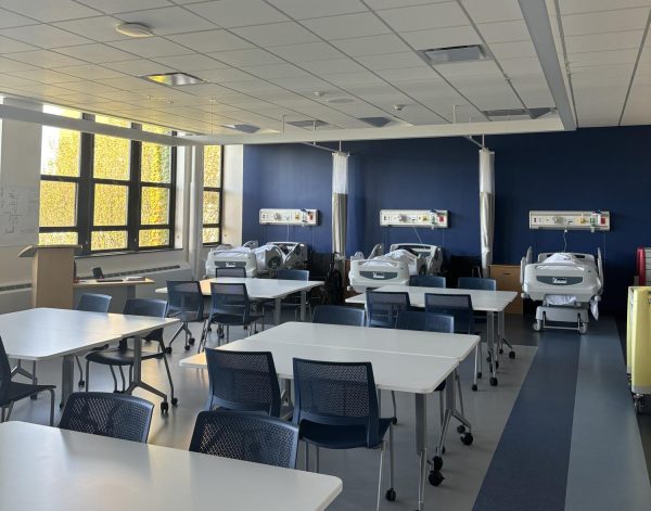 The new health sciences lab features a classroom and five hospital beds.