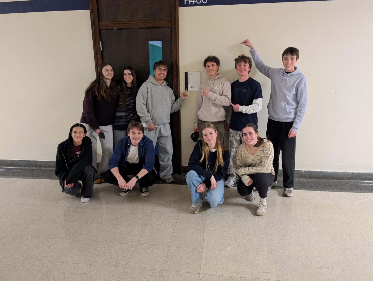 The E-Town Explores team poses on the fourth floor. THE EVANSTONIAN