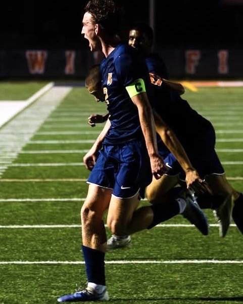 Soccer senior captain Louis Dush-Hart celebrating after a big goal. SAM ZAKARIN/THE EVANSTONIAN